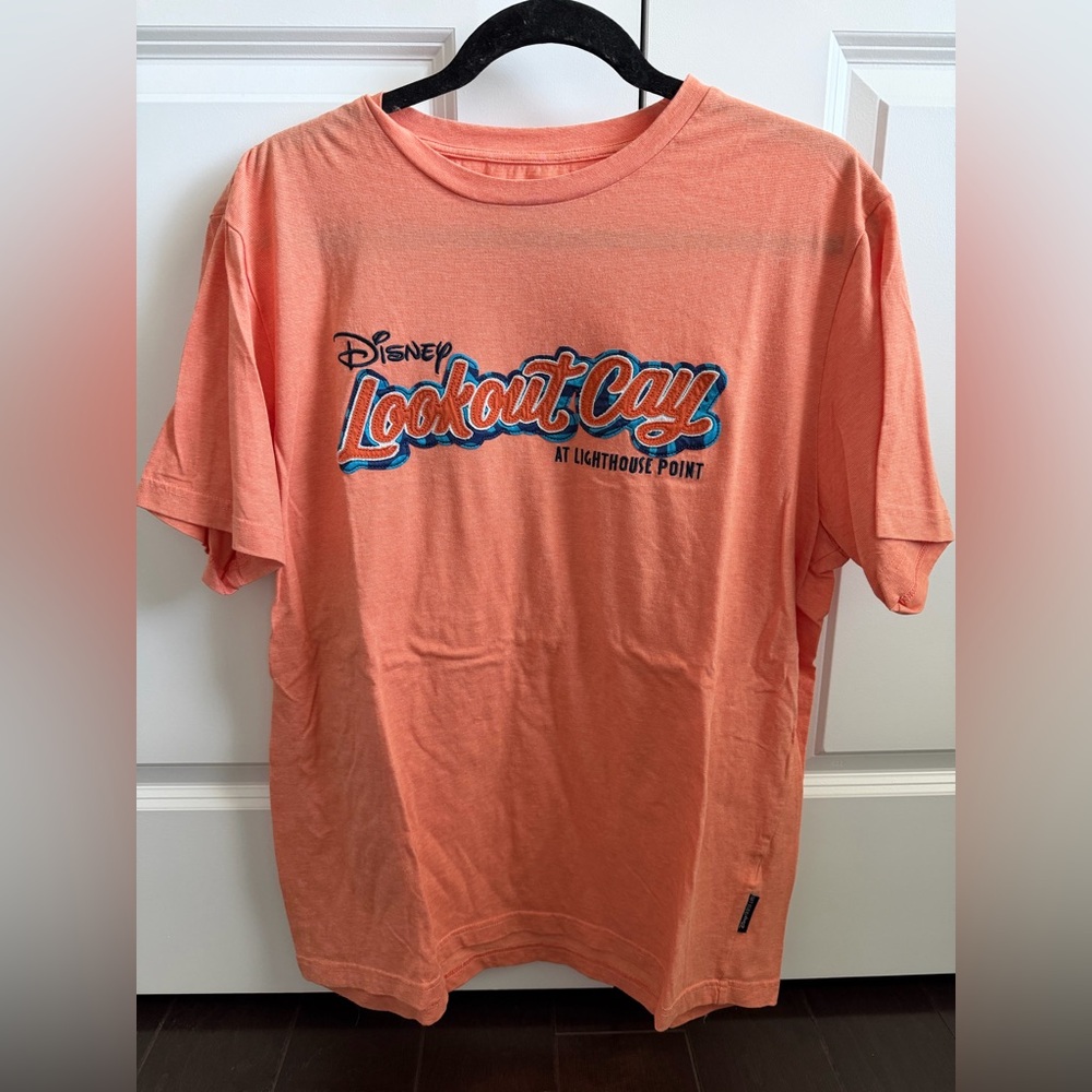 Disney Lookout Cay Short Sleeve Tee - Coral Orange with Blue Logo